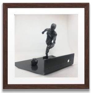 escultura de futbol